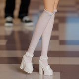 Barbie x Clueless Cher Doll