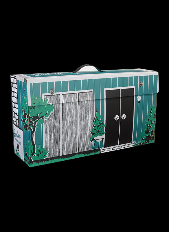 1962 Barbie Dreamhouse, a folding teal cardboard playhouse with illustrated trees and doors