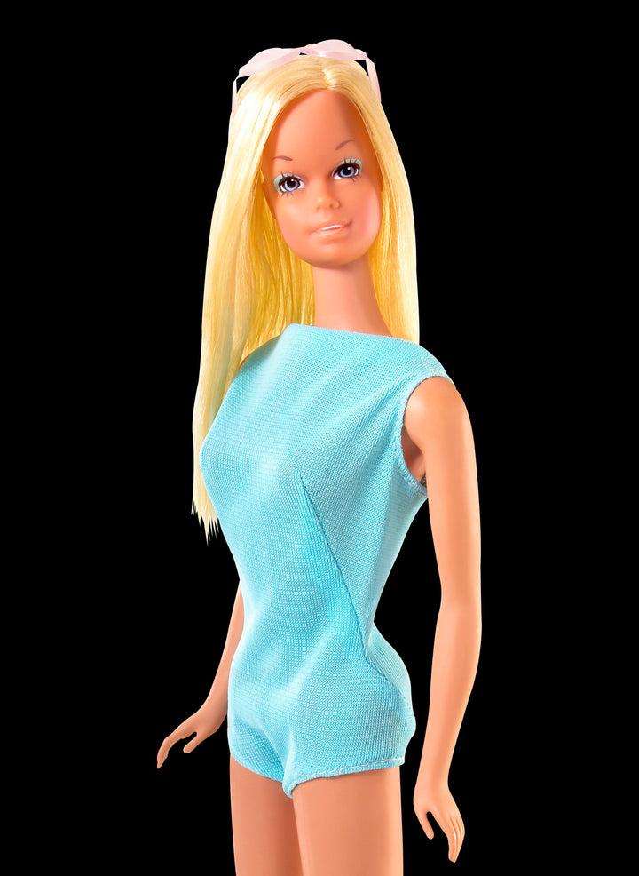1971 Malibu Barbie doll with golden tan skin and long straight blonde hair