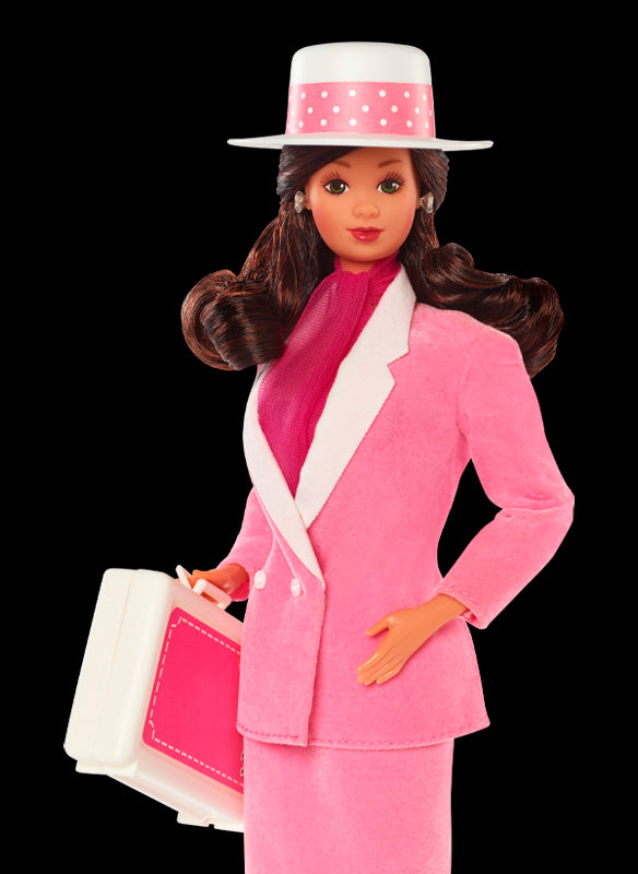 1985 Day-to-Night Barbie doll in a power suit, embodying women's expanding role in the workplace