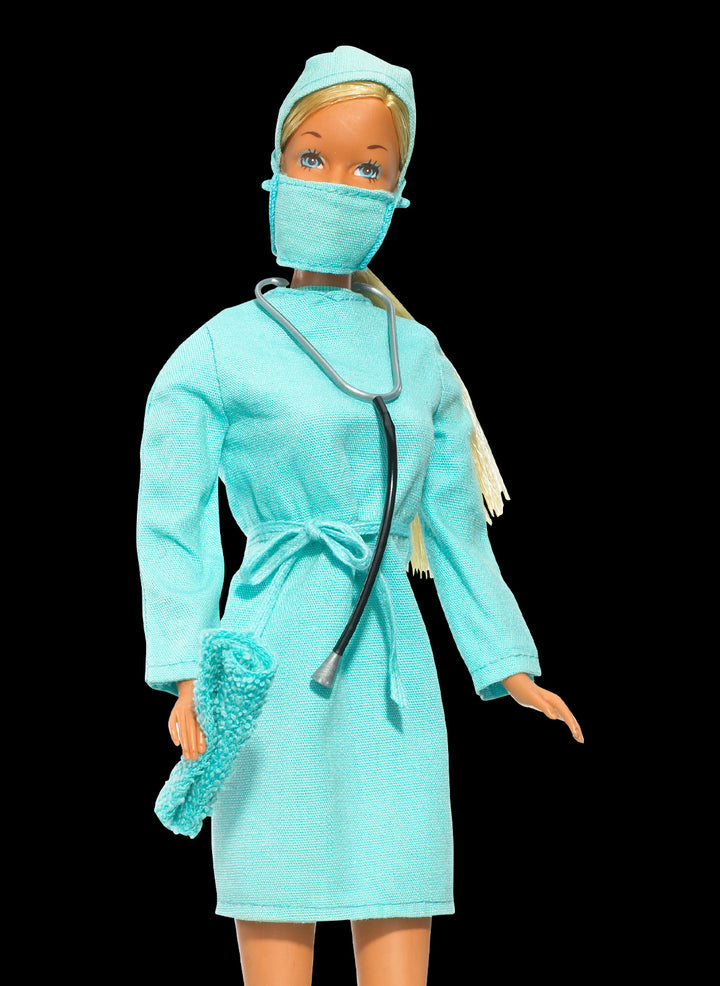 1973 Doctor Barbie doll wearing a medical coat, representing women in professional careers
