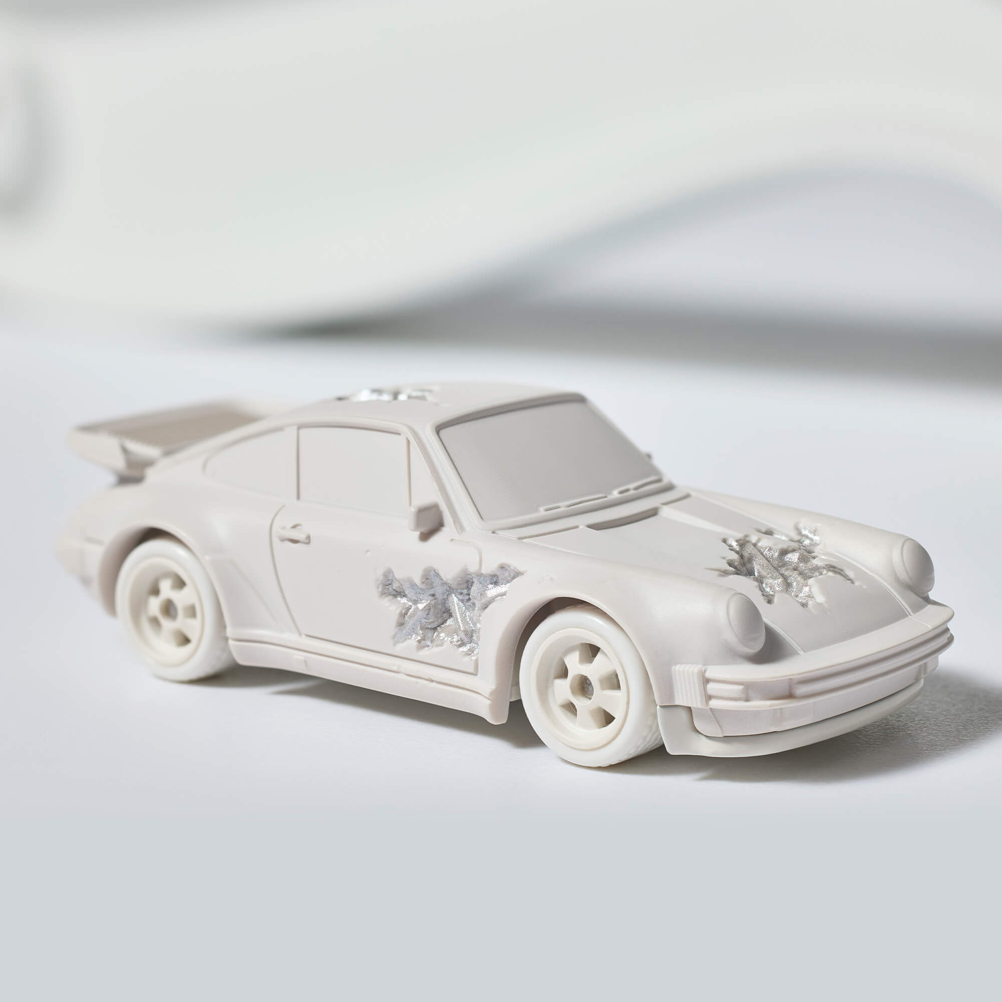 Hot Wheels x Daniel Arsham Eroded Porsche 930 and Rally Case