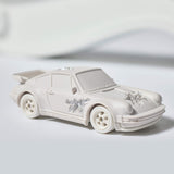 Hot Wheels x Daniel Arsham Eroded Porsche 930 and Rally Case