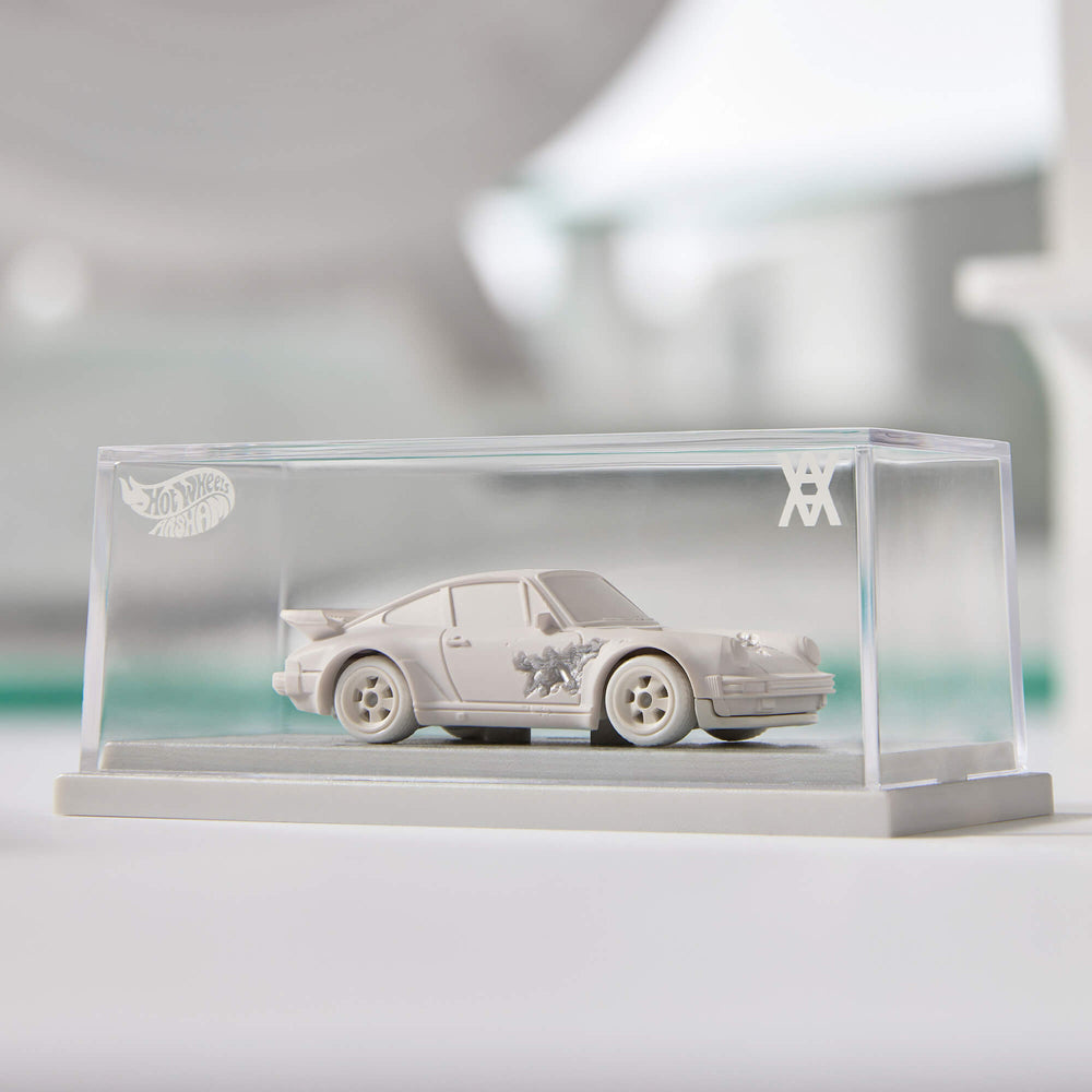 Hot Wheels x Daniel Arsham Eroded Porsche 930 and Rally Case